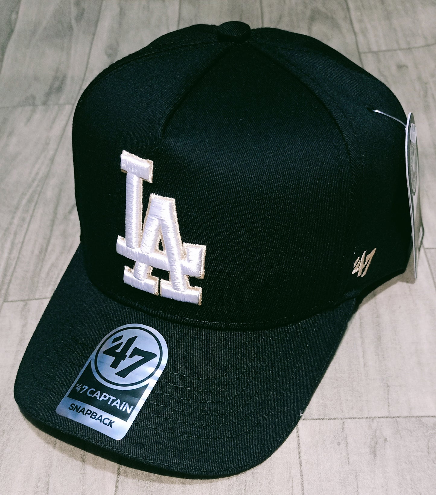 Gorra 1.1  L.A Negra Logo Blanco